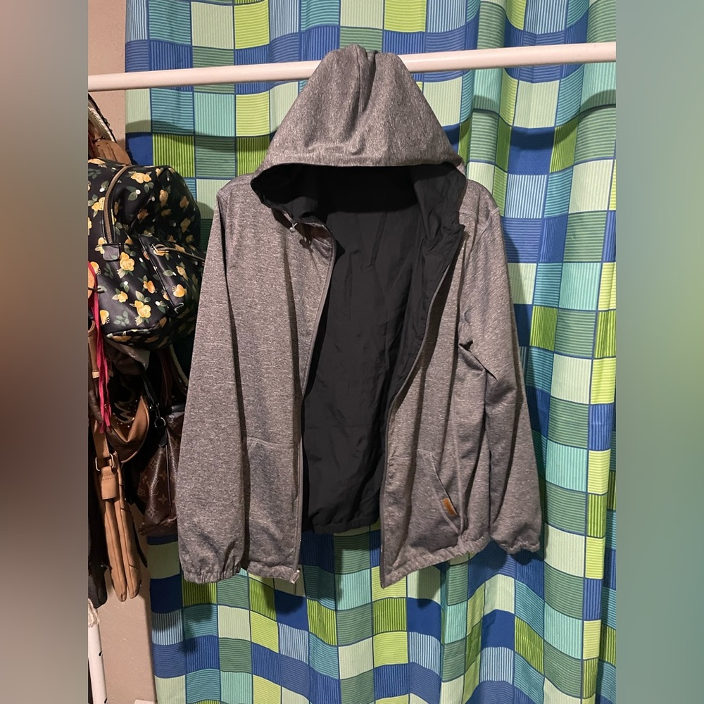 Woman’s Voyager Reversible Rain jacket size medium